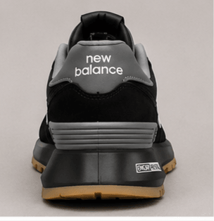New Balance 574 Noir & Semelle Gomme